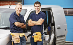 Hvac Technicians Standing Next To Each Other