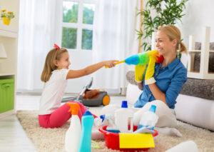 Happy Mom And Daughter Cleaning
