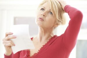 Woman Stressed Over High Energy Bill